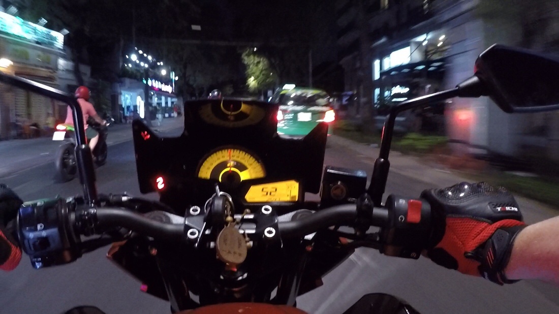 Following a Club Kawasaki Ninja 300 in Saigon 