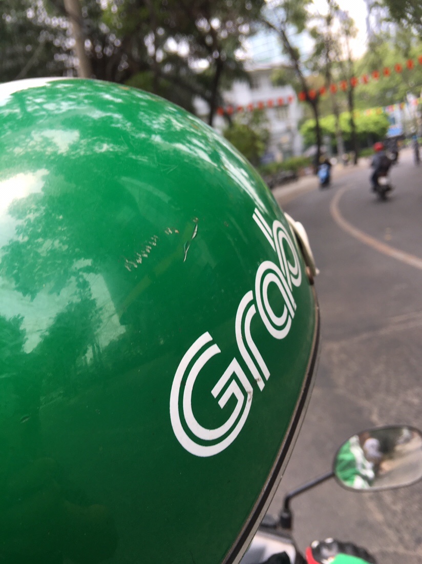UberMoto with GrabBike uniform in Saigon 