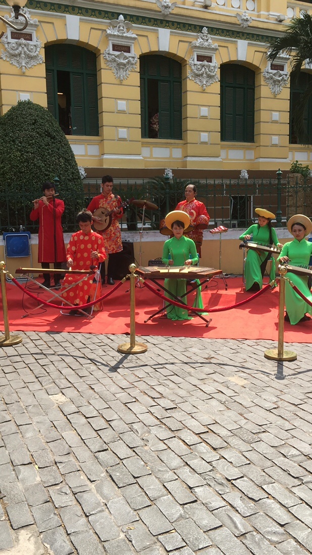 Vietnamese traditional music at the Central Post Office in Saigon 