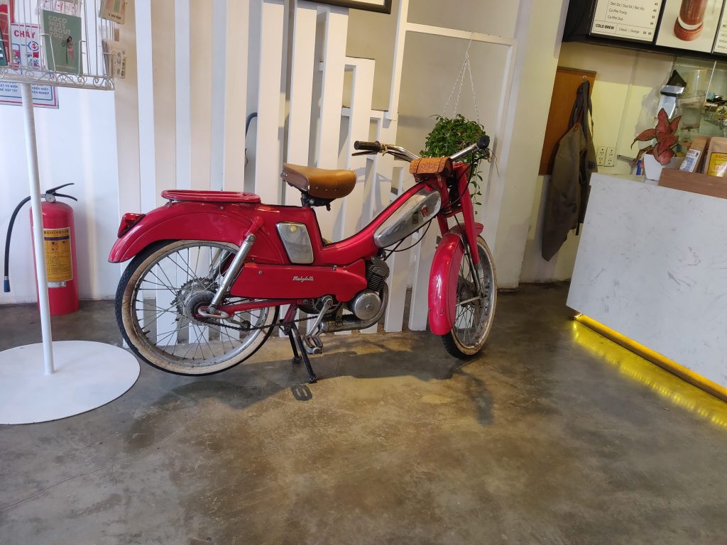 Old ebike at Saigon Siblings Cafe