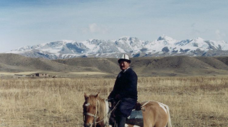 Kyrgyz man on a horse - Naryn, Kyrgyzstan