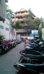 Buddhist Pagoda and Parking Lot in Saigon