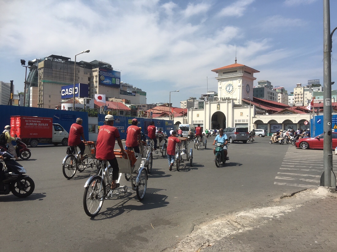 Cyclos in front of Ben Thanh Market 